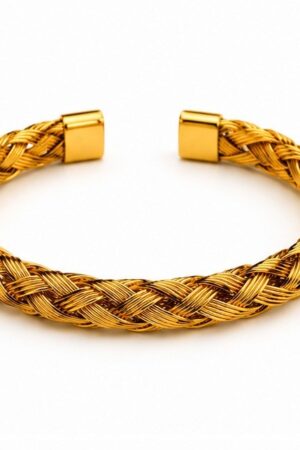 Gold plated stainless steel unisex open cuff bangle featuring an intricate braided cable wire design with polished square end caps on a white background