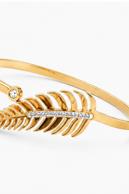 The Pluma Leaf Stainless Steel Bangle – Crossover Bypass Cuff with Crystal Encrusted Feather Motif