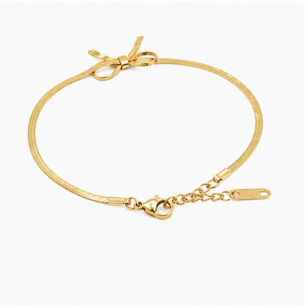 The Coquette Bow Stainless Steel Bracelet - Flat Herringbone Chain with Textured Ribbon Charm - Image 4