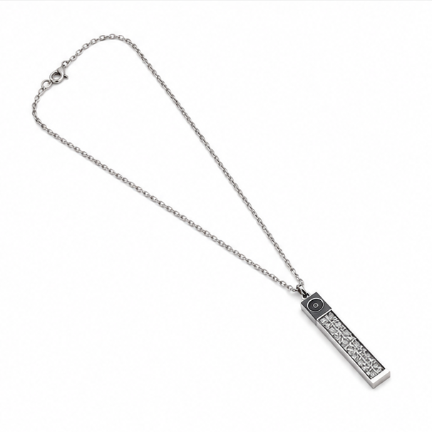 Right angled overview of a silver unisex stick bar pendant necklace showing the secure lobster clasp.